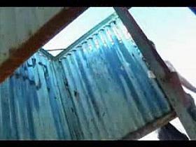 Woman changing at the beach