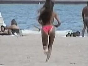 Tan lined booty hiding underneath candid pink bikini 06zi