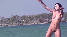 Girls Playing Games at the Nude Beach