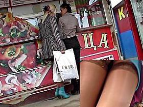 Nylons up the petticoat of a golden-haired