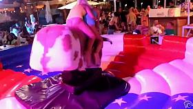 Bimbos in panties ride the mechanical bull together