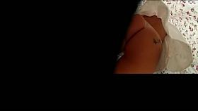 upskirt con tauaggio