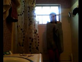 Teenage brunette on the toilet and in the shower