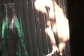 Through curtain voyeur cam