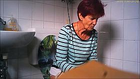 granny piss on the toilet