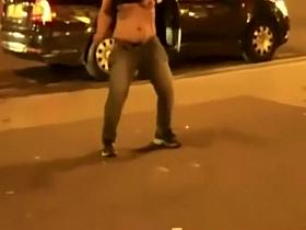 Drunk girl stripping in front of a club