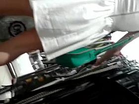 risky upskirt of a nice girl standing next to her boyfriend