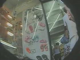 Upskirt shoe shopping brunette in a black dress and big round ass porno