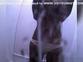 Small tits girl spied in beach cabin