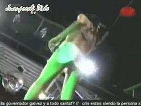 Attractive babe with awesome body dancing on a cool concert