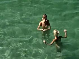 Nudist friends on the beach