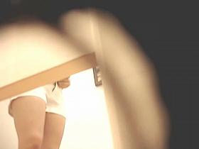 Girl in tight jeans shorts on spy cam in changing room