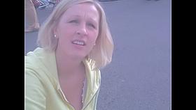 Blonde smiles into cam flashing the hot downblouse