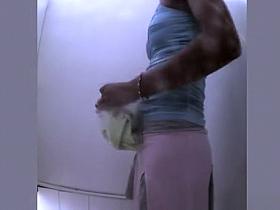 Tight body teen dressing in beach cabin