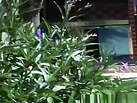 Woman in tight sports pants and tight blue top