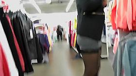 Provoking babe in stockings flashes her tight slit in a pub