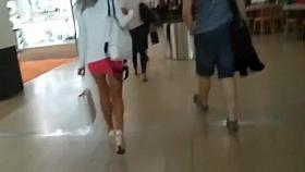 Sexy legs in shiny pantyhose