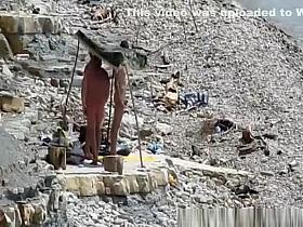 Nudist couple fucking in the water and shore