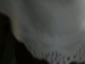 Sizzling hot long wavy haired brunette with a beaty of an ass upskirt