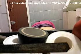 Pissing lady caught by a spy cam