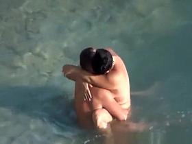 Nudists fucking in the water