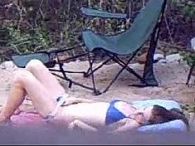 girl next door masturbating in yard (hidden camera)