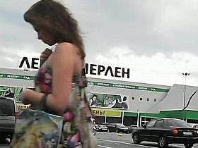 Upskirt voyeur films a bodacious beauty in sexy pantyhose.