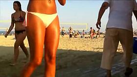 Hot beach babe waits for her friend