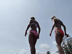 Hot wet girls jumping off a cliff