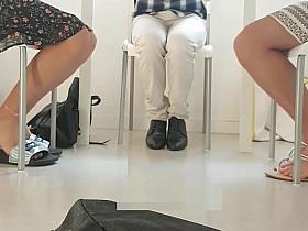 Teachers playing with their feet in staffroom