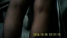 Blonde in black pantyhose on escalator