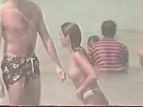 Topless teen girl - beach video