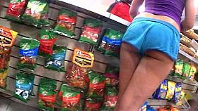 Cheeks in blue short shorts