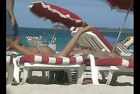 Beach voyeur movies present hot naked bodies basking in the sun.