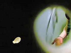 Brunette shows tits and nub before hole in change room wall