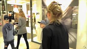 Brave blonde urinates on the middle of the crowded street!