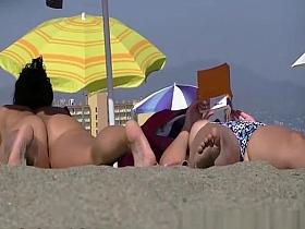 Nude and topless women at beach