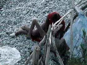 Horny couple spied on a beach