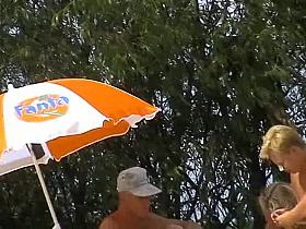 The group of real nudists playing cards on my voyeur camera