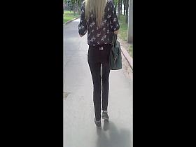 Voyeur nice ass in tight shiny jeans