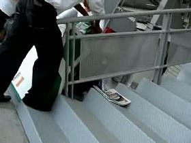 Up the stairs and up the skirt for a video of blue panties