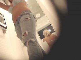 Girl in tight jeans shows herself in bra on hidden spy cam