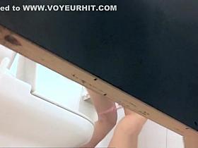 Woman in high heels pissing