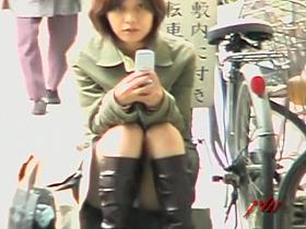 Affectionate young tramp reading some text messages during wild sharking