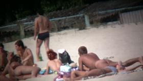 Nudist beach voyeur shoots naked babes sunbathing