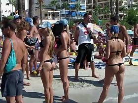 Bar girls dancing on the beach