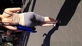 Chick in sports outyfit in street