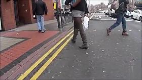 Boots and tights on a blonde on the street