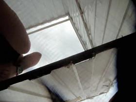 Girl in beach dressing room is changing her cloths