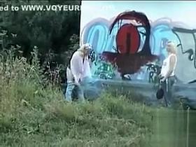 Two blondes go to take a leak